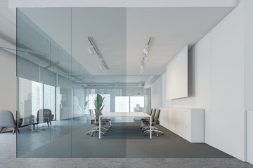 White and glass meeting room with screen