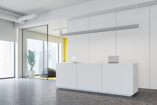 White and yellow office reception and waiting room
