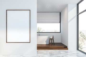 White loft bathroom with tub and poster