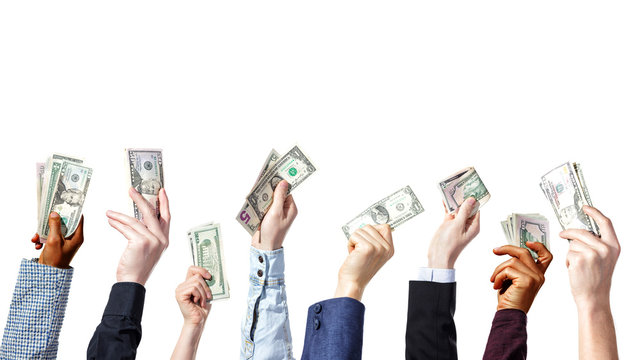 Business concept - you have to pay for everything. Human hands with dollars raised up, isolated on white background.
