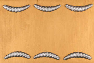 Obraz premium Gypsum cornice, stucco, moldings, friezes on a gold background, copy space.