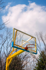 Basketball hoop cage in the park.