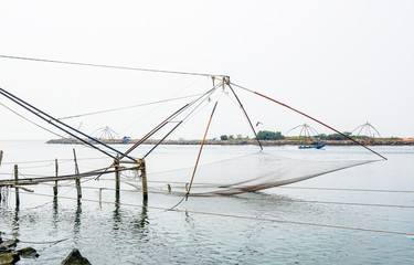 traditional Chinese fishing net in kerala kochi ernakulam munambam beach