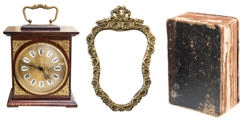 Set of beautiful antique items, Antique clock, golden frame and shabby old book.