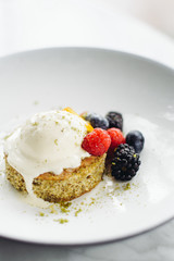 cake with cream and fresh berries