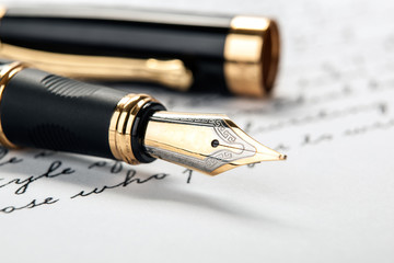 fountain pen on paper with ink text