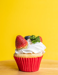 cupcake with whipped cream