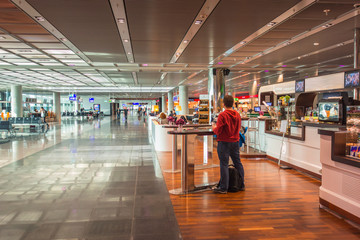 Cafeteria at airport terminal with a person
