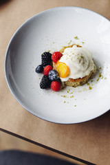 dessert with whipped cream and berries