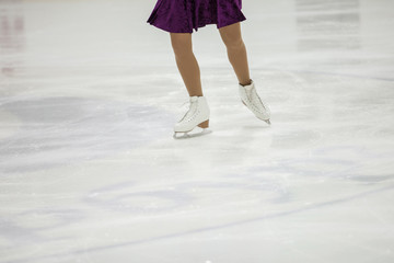 Figure skating, ice skating training. Feet skater on the ice