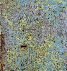 Old aged damaged weathered steel rusty metal iron box door key lock colored surface with rust and crackle paint effect background