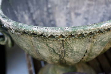 Closeup of a old vintage vase with patina