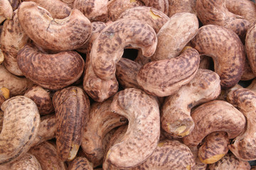 Fototapeta na wymiar Cashew nuts as background or pattern