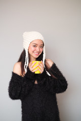 Asian girl wearing winter clothing