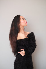 Asian girl wearing winter clothing