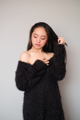 Asian girl wearing winter clothing
