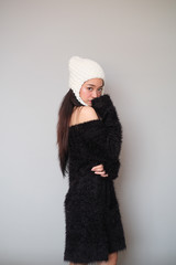 Asian girl wearing winter clothing