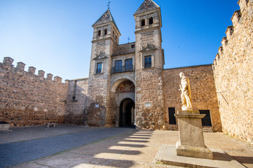 Fototapeta na wymiar internal view of puerta bisagra with statue at toledo, spain - english translation : bisagra gate