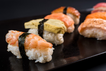 sashimi sushi set on black background