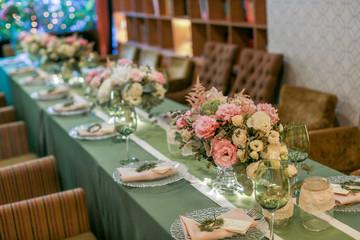 Festive wedding table, decorated with sweets and drinks