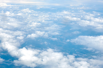 Lush white clouds view from the plane, great height.