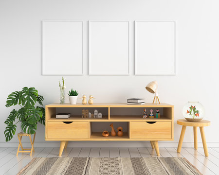 Three blank photo frame for mockup and sideboard in living room, 3D rendering