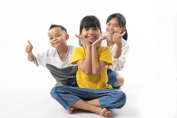 funny and cute group of Asian children looking and surprise