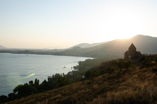 old Sevanavanq monastery in Sevan, Armenia while sunset