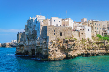 Coast of Polignano a Mare on sunny summer day, view from sea