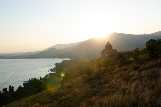 old Sevanavanq monastery in Sevan, Armenia while sunset