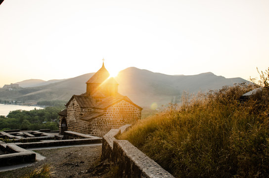 old Sevanavanq monastery in Sevan, Armenia while sunset