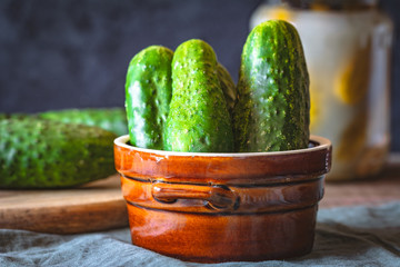 Bowl with fresh cucumbers ready for marinating