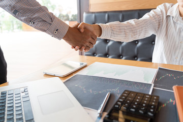 Business Meeting agreement Handshake concept, Hand holding after finishing up dealing project or...