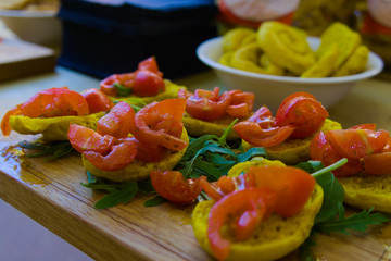 crostini topped with tomatoes sold on the street fair