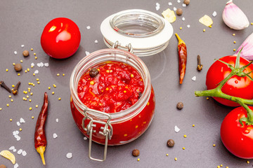 Tomato confiture, jam, chutney, sauce. Homemade preservation concept
