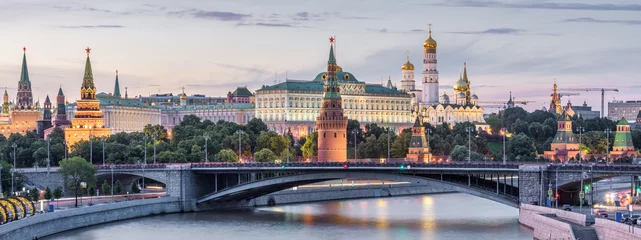 Wall murals Moscow Moscow Kremlin at dusk, Russia. Panoramic view of the famous Moscow center in summer evening. Ancient Kremlin is a top landmark of Moscow. Beautiful cityscape of the old Moscow city in twilight.