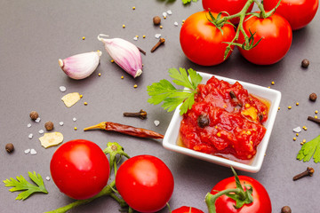 Tomato confiture, jam, chutney, sauce. Homemade preservation concept