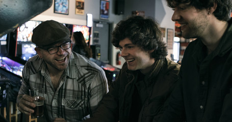 Fototapeta premium Arcade: Having Fun With Friends Playing Video Games