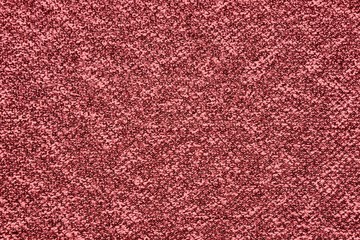 Fototapeta premium Red wool background with patterns. Red woolen fabric texture