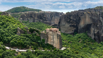 Fototapeta na wymiar Secluded Greek monastery on top of rock cliff v7
