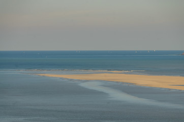 Climbing the tide on Mont Saint Michel in autumn. France