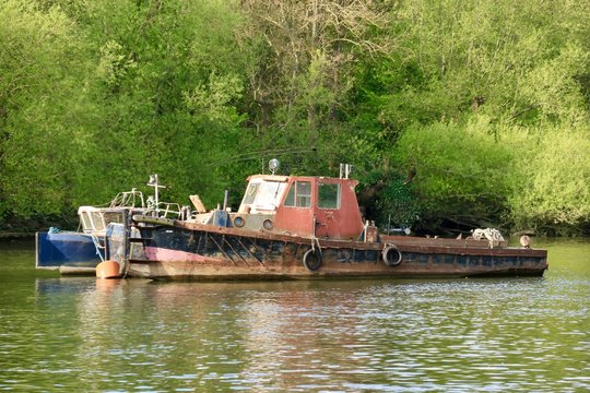Old barge on the river thames