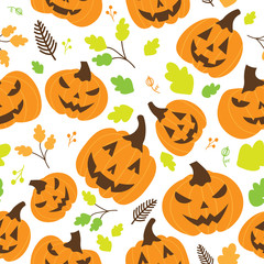Halloween pumpkins with carved faces seamless pattern on white background with green autumn leaves.