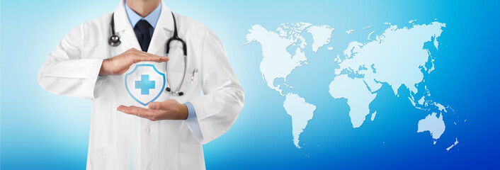 international travel medical insurance concept, doctor's hands protect an shield cross icon,...
