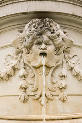 sculpture, head with water, foutain Opatija, croatia