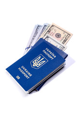 Ukrainian biometric passport and money inside it. Id document isolated on a white .