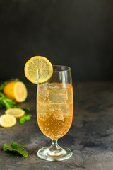 lemonade with lemon and ice (cooling drink). top food background. copy space