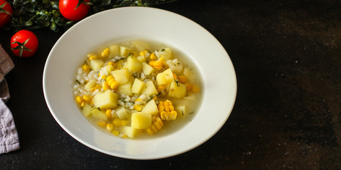 soup with corn and vegetables (first course). top food background. copy space