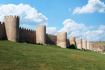 Fototapeta na wymiar Walls surrounding Spanish city of Avila, turrets