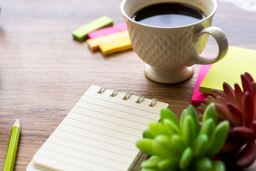 a cup of black coffee always appears on working table 